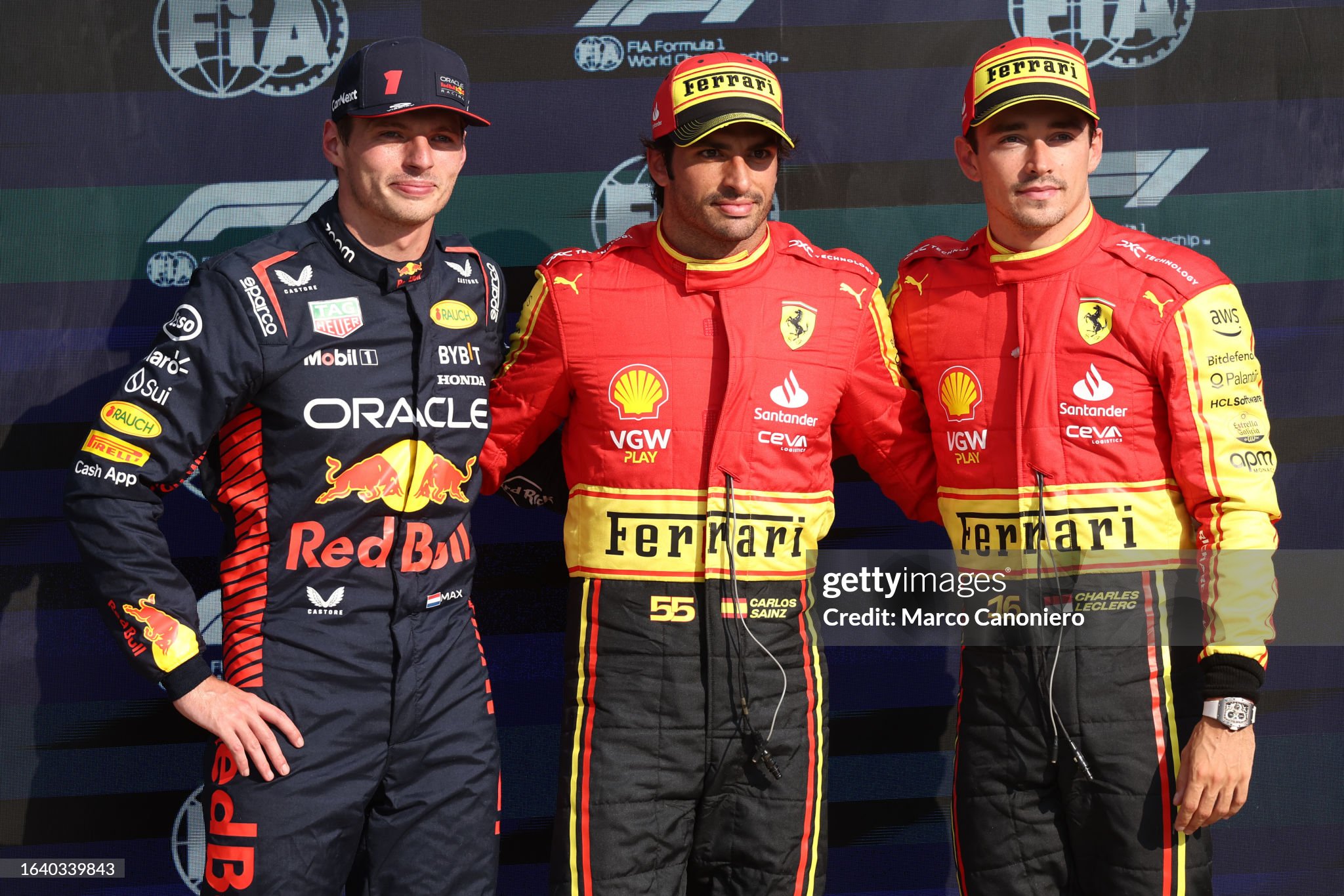 Carlos Sainz of Scuderia Ferrari, first place, Charles Leclerc of Scuderia Ferrari, third place and Max Verstappen of Red Bull Racing, second place, in the park ferme at the end of qualifying for the F1 Grand Prix of Italy at Autodromo Nazionale of Monza on September 02, 2023.