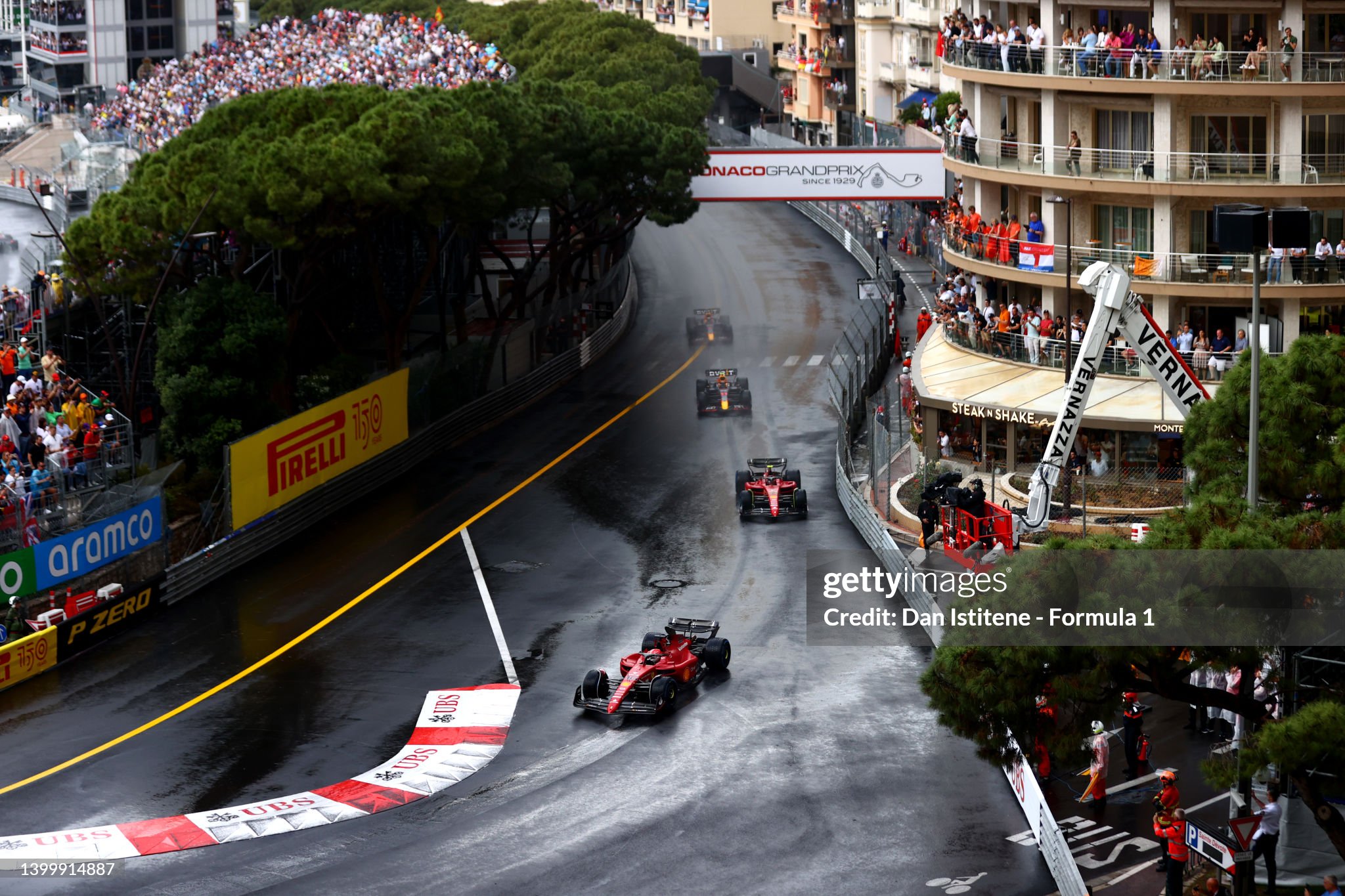 Charles Leclerc leads Carlos Sainz and the rest of the field at the start of the F1 Grand Prix of Monaco at Circuit de Monaco on May 29, 2022. 