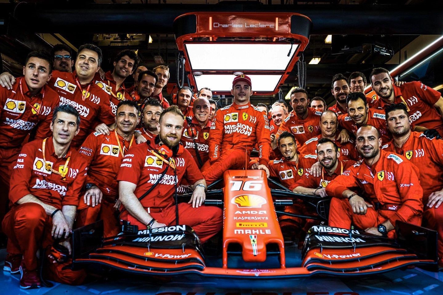 Charles Leclerc in a group photo with the Ferrari team.