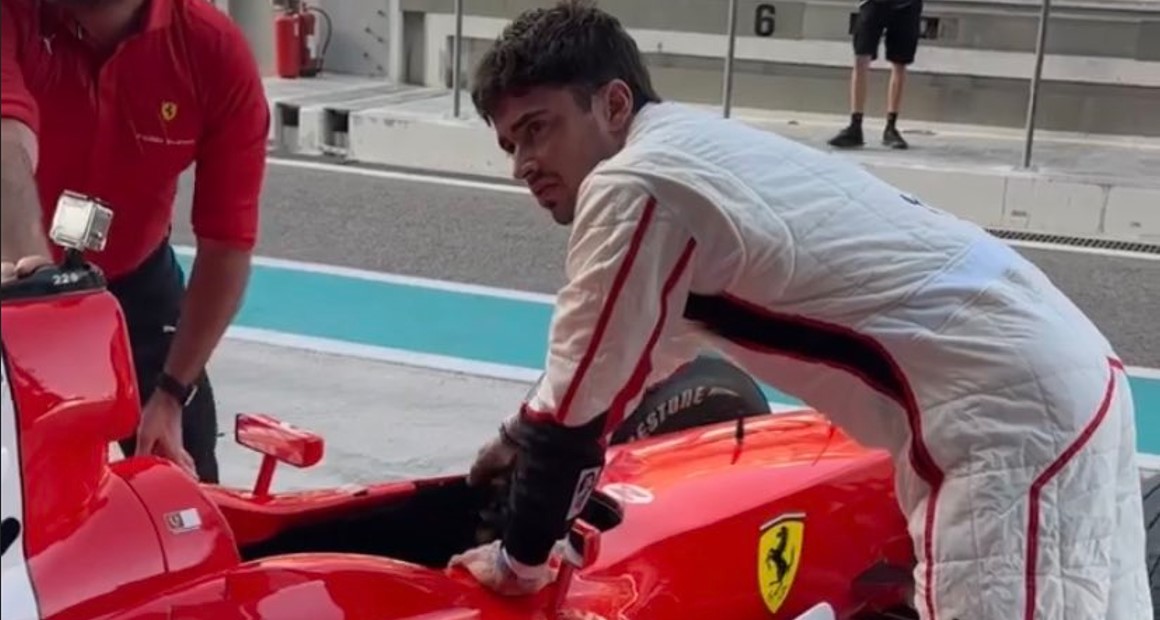 Charles Leclerc with Schumacher's Ferrari F2003 in Abu Dhabi.