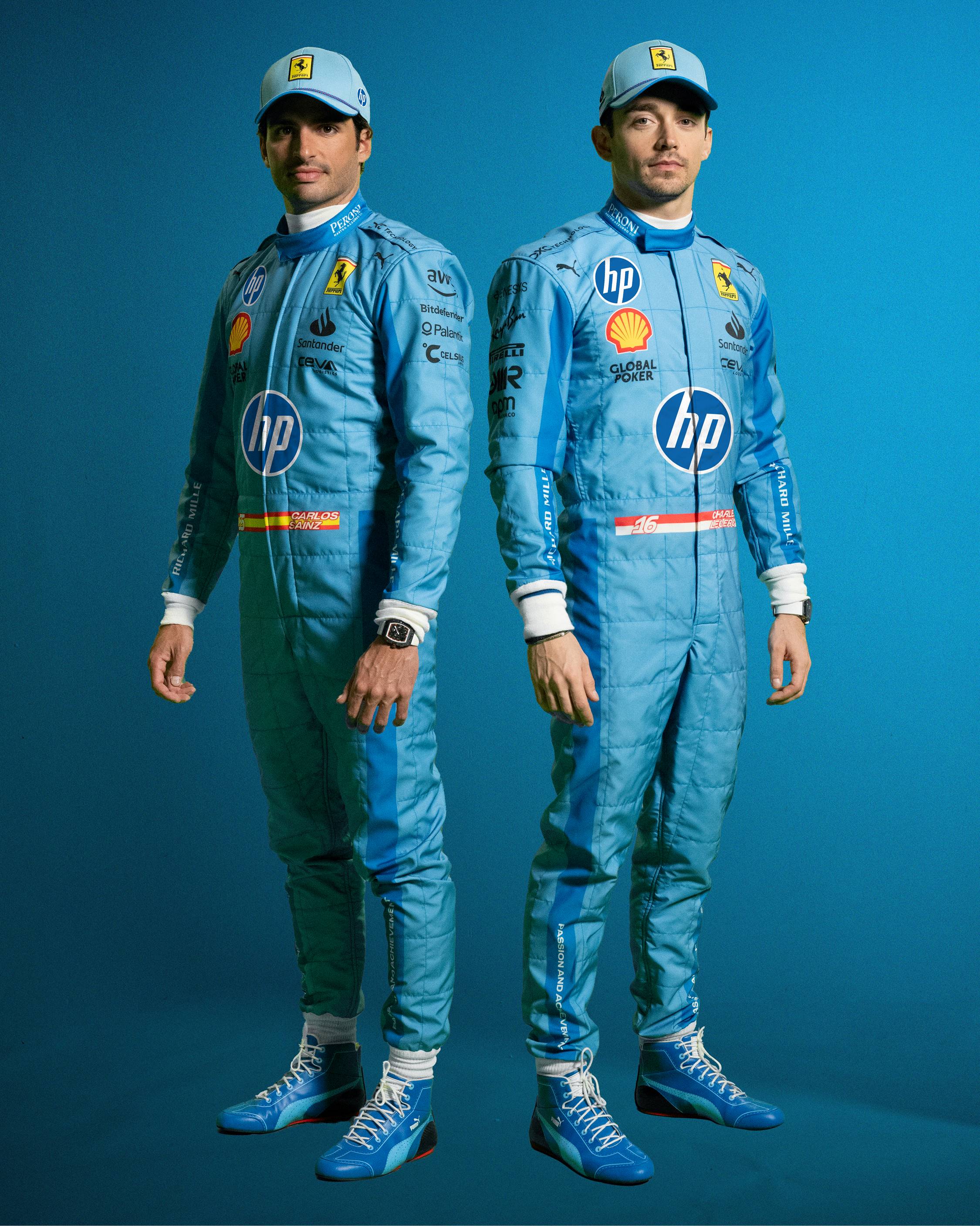 Charles Leclerc and Carlos Sainz in blue overalls at the 2024 Miami Grand Prix. 