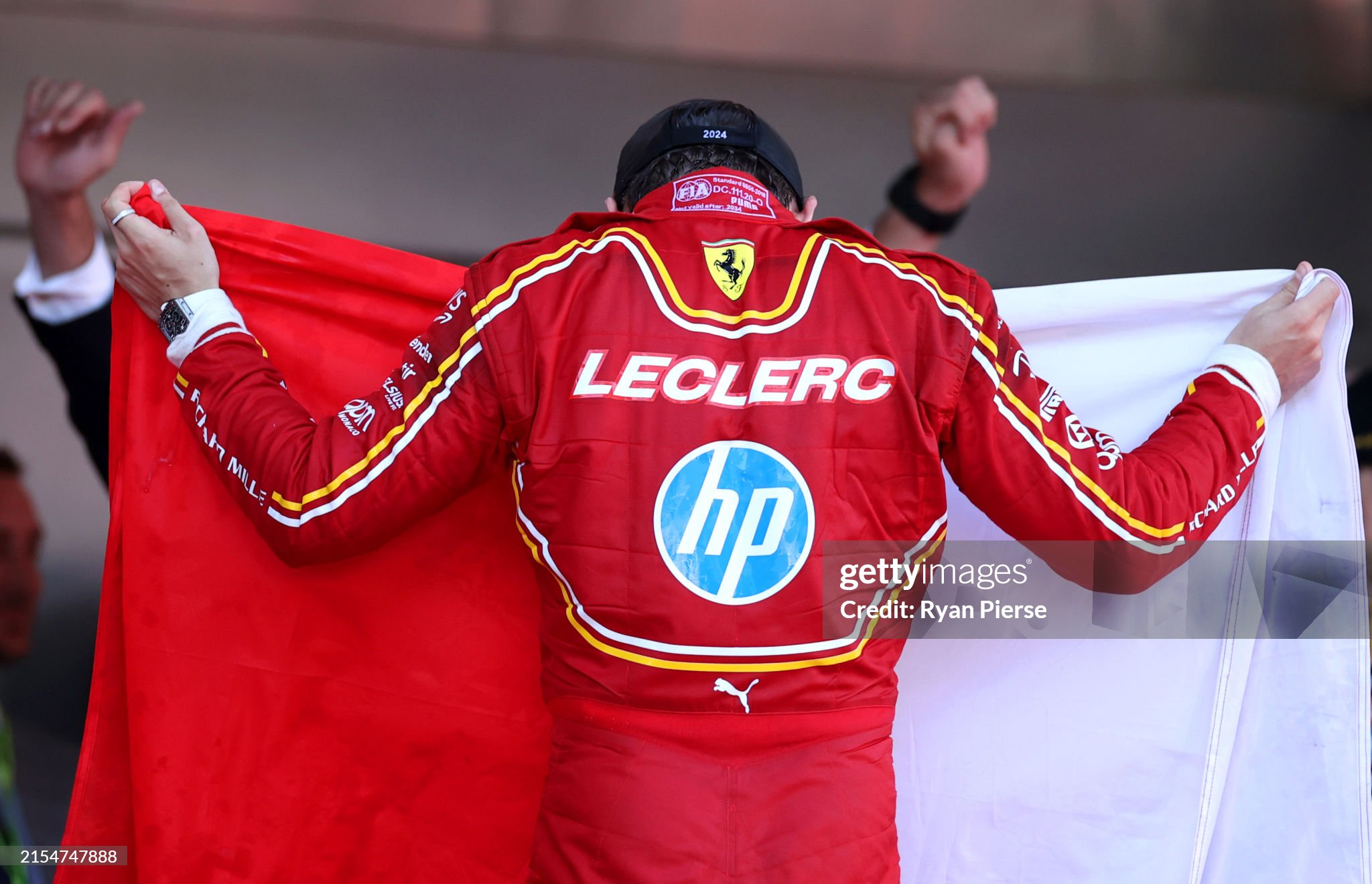 Race winner Charles Leclerc of Monaco and Ferrari celebrates on the podium after the F1 Grand Prix of Monaco at Circuit de Monaco on May 26, 2024. 