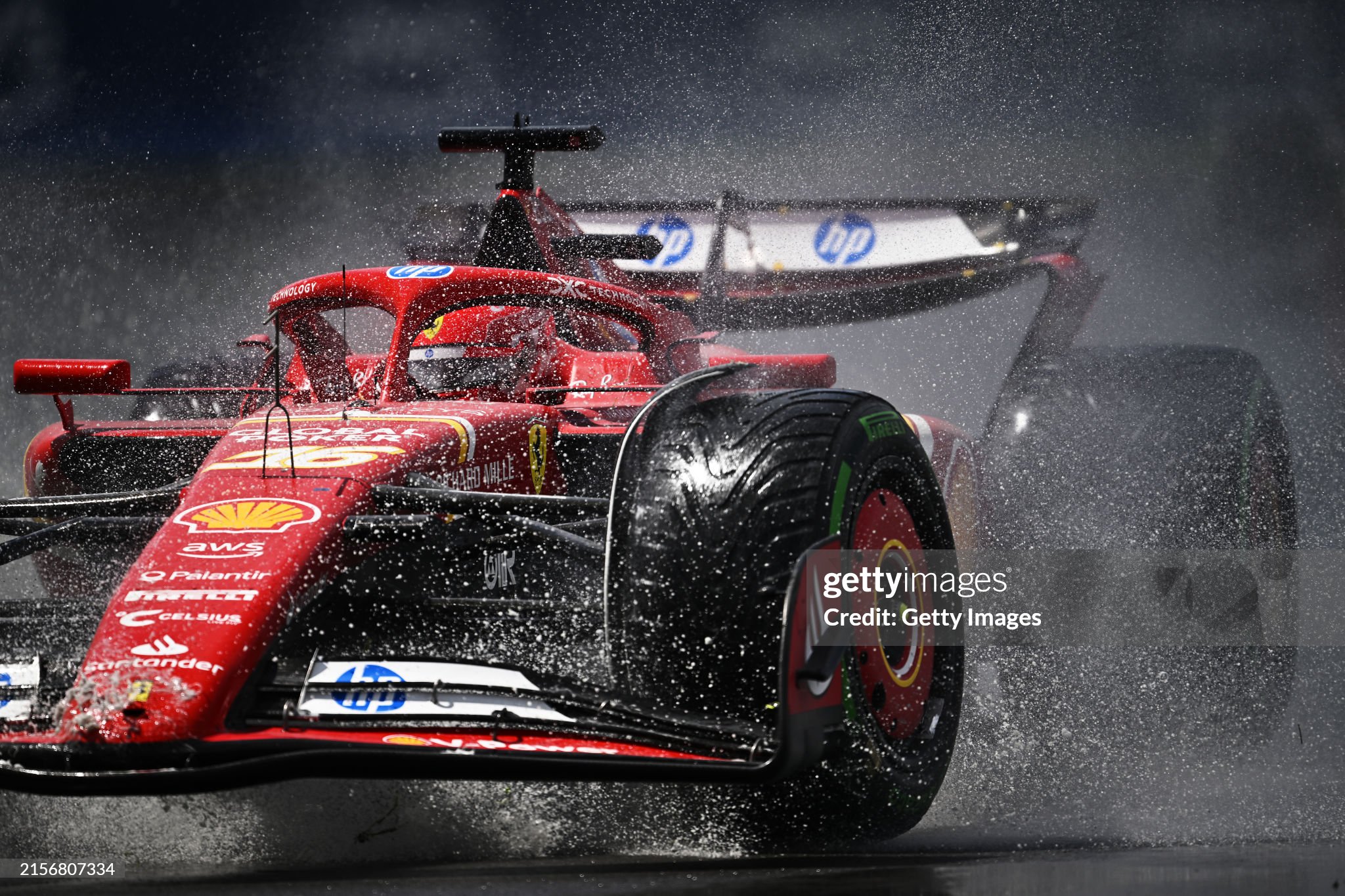 Charles Leclerc driving the Ferrari SF-24 runs through a puddle on track during the F1 Grand Prix of Canada at Circuit Gilles Villeneuve on 09 June 2024 in Montreal, Quebec. 