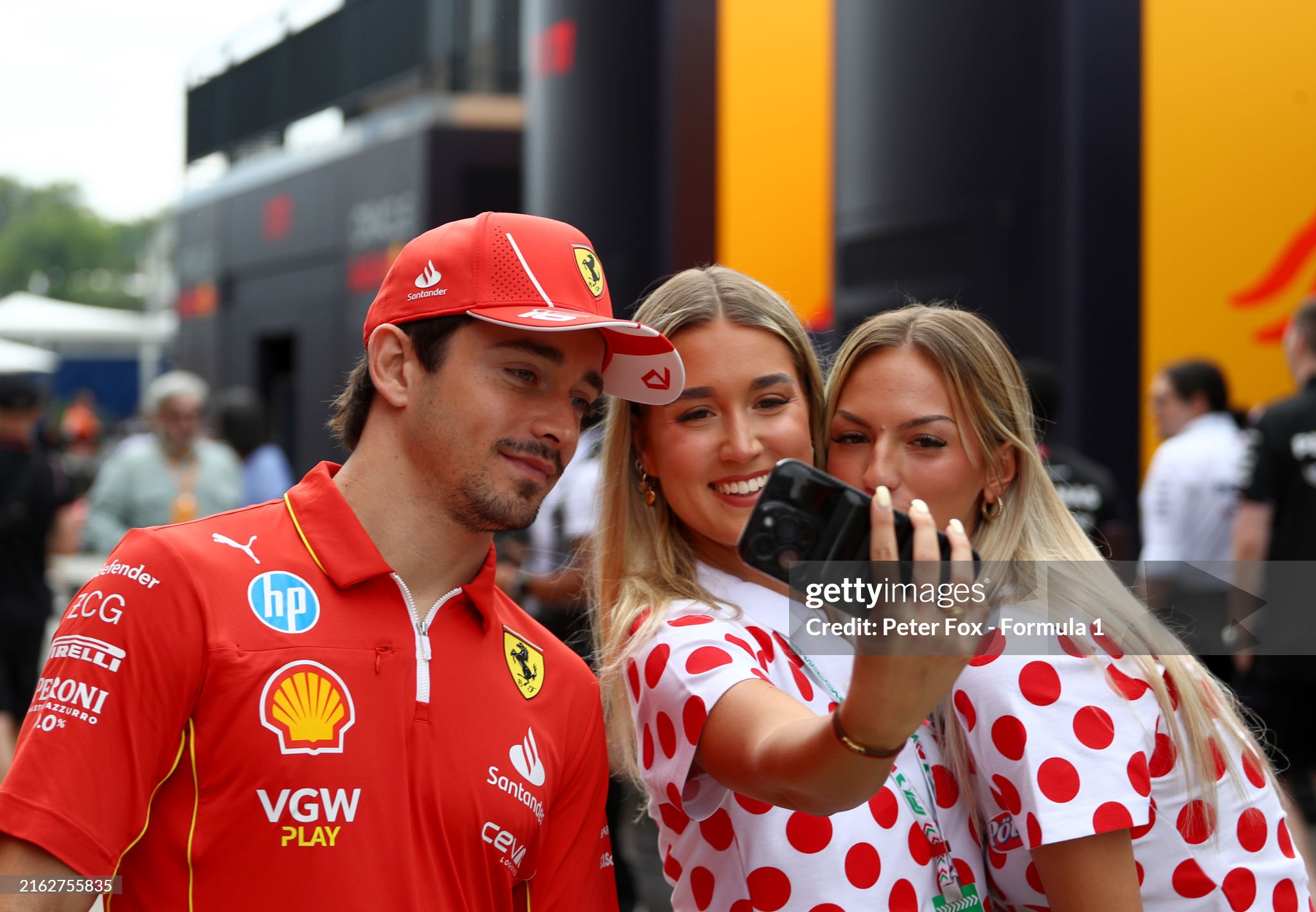 Charles Leclerc poses for a photo with fans in the paddock prior to final practice ahead of the F1 Grand Prix of Hungary at Hungaroring on July 20, 2024. 