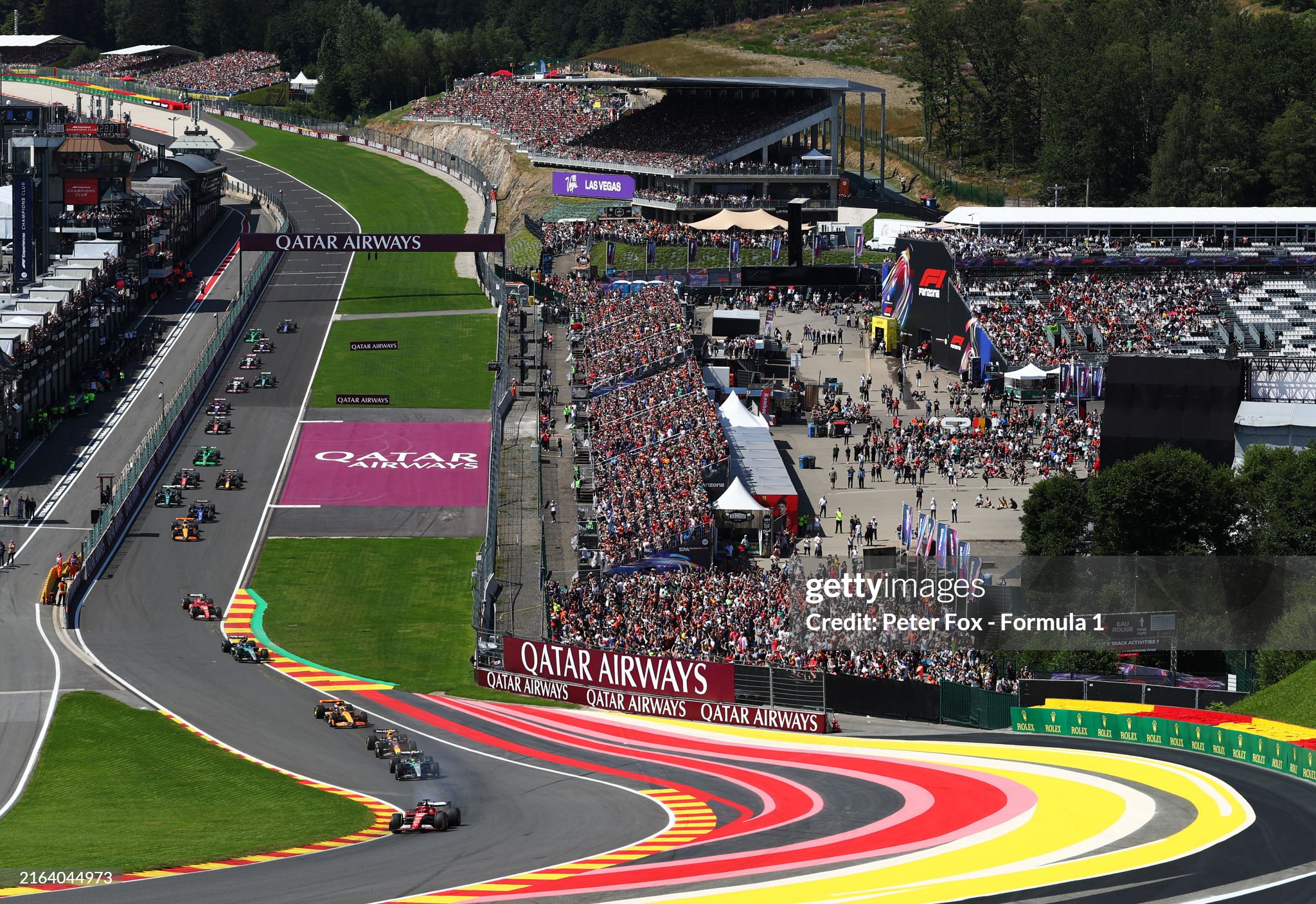 Charles Leclerc of Monaco driving the Ferrari SF-24 leads the field at the start of the F1 Grand Prix of Belgium at Circuit de Spa-Francorchamps on 28 July 2024 in Spa, Belgium.