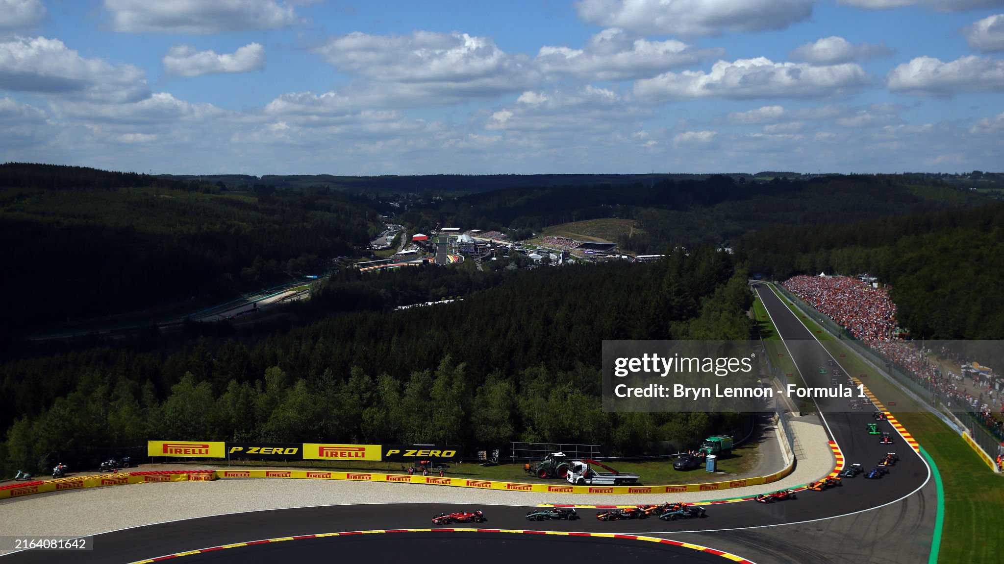 Charles Leclerc leads Lewis Hamilton and the rest of the field at the start of the F1 Grand Prix of Belgium at Circuit de Spa-Francorchamps on July 28, 2024.