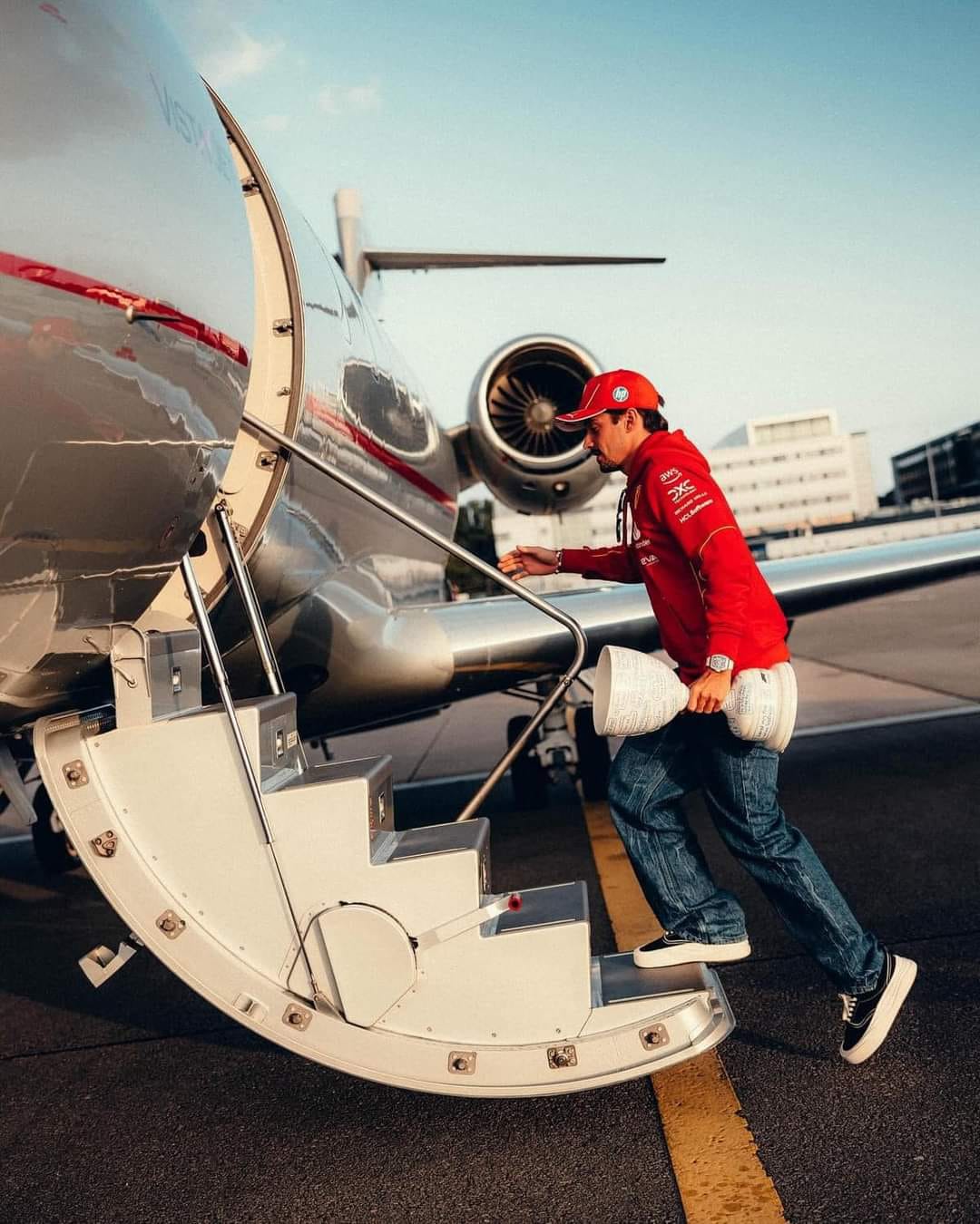 Charles Leclerc flies home his third-place trophy at the 2024 Zandvoort Grand Prix.