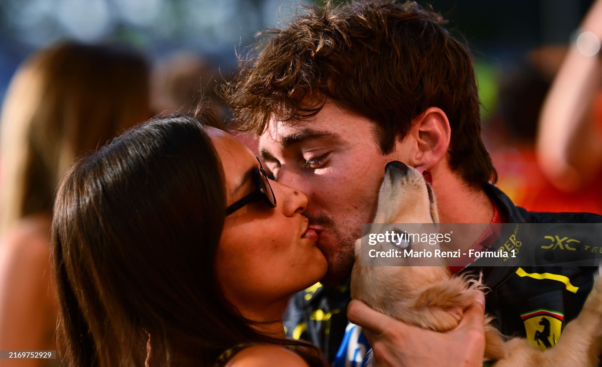 Race winner Charles Leclerc of Monaco and Ferrari celebrates the race win with Alexandra Saint Mleux in the paddock during the F1 Grand Prix of Italy at Autodromo Nazionale Monza on September 01, 2024.