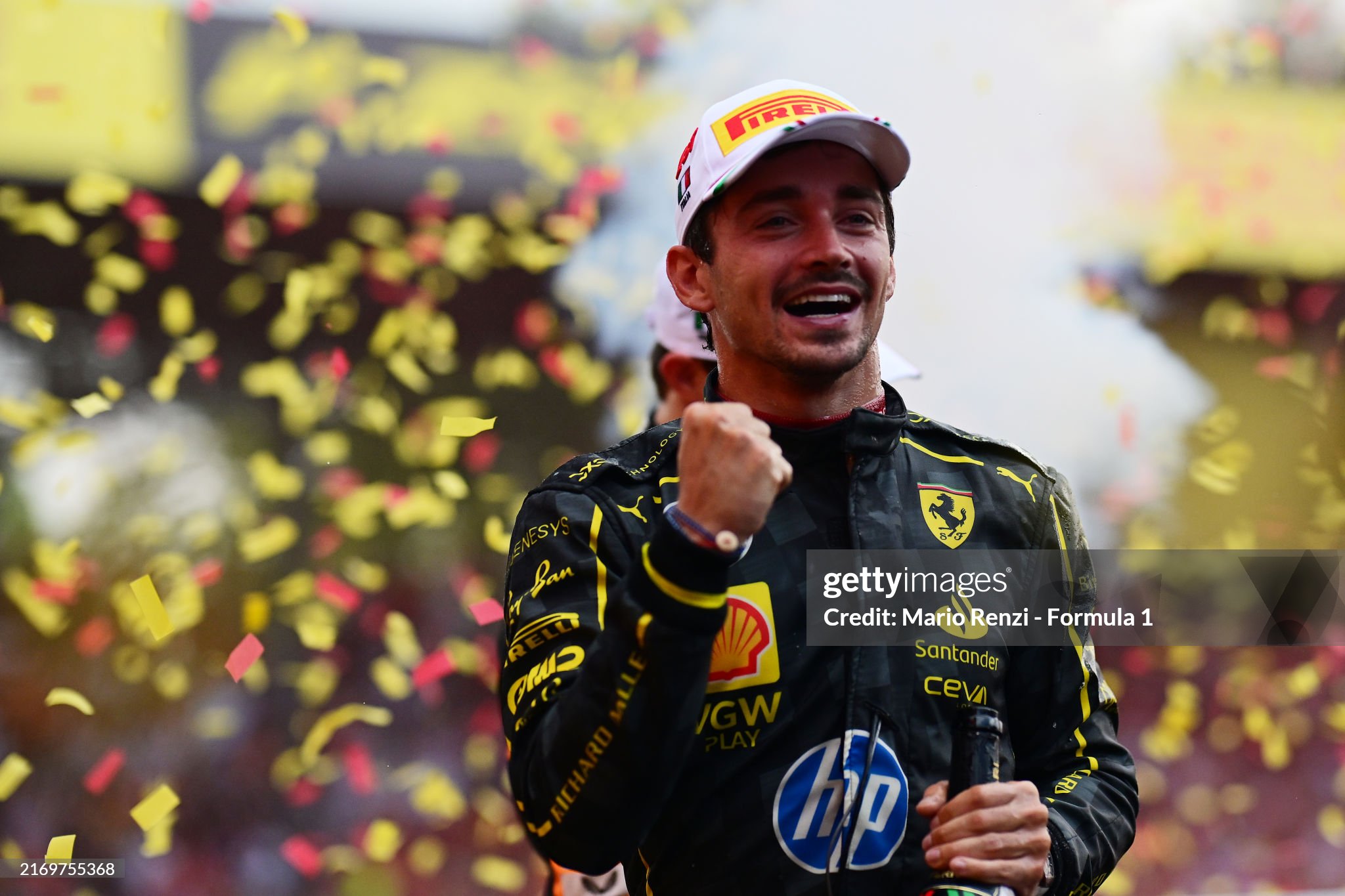 Race winner Charles Leclerc celebrates on the podium after the F1 Grand Prix of Italy at Autodromo Nazionale Monza on September 01, 2024. 