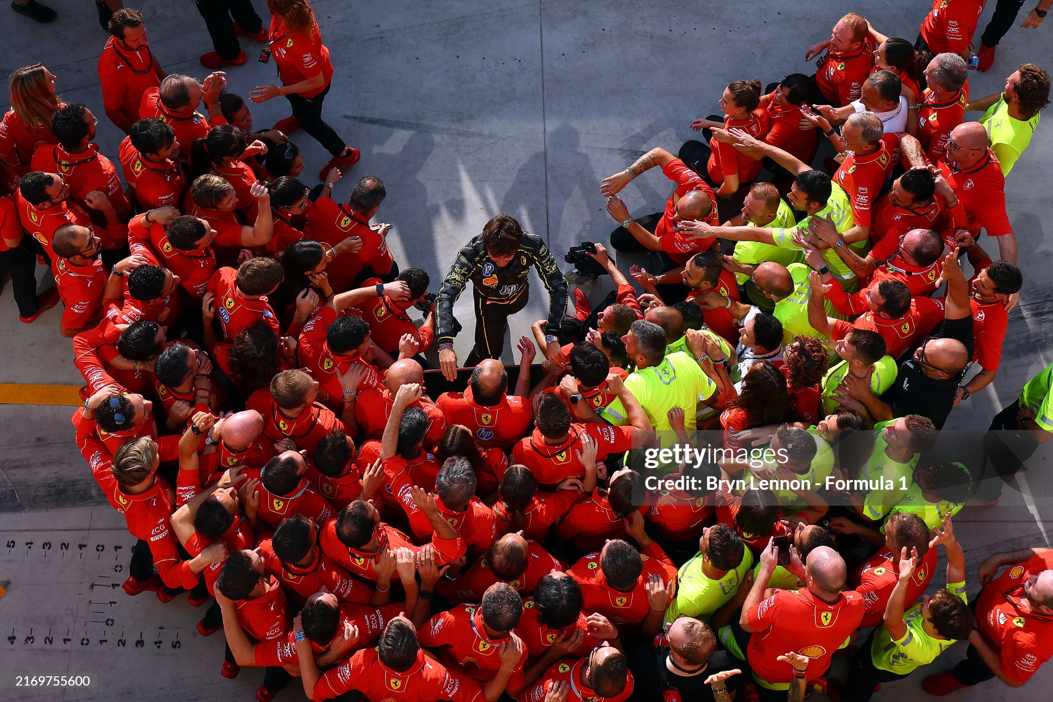 Race winner Charles Leclerc celebrates with his team after the F1 Grand Prix of Italy at Autodromo Nazionale Monza on September 01, 2024. 