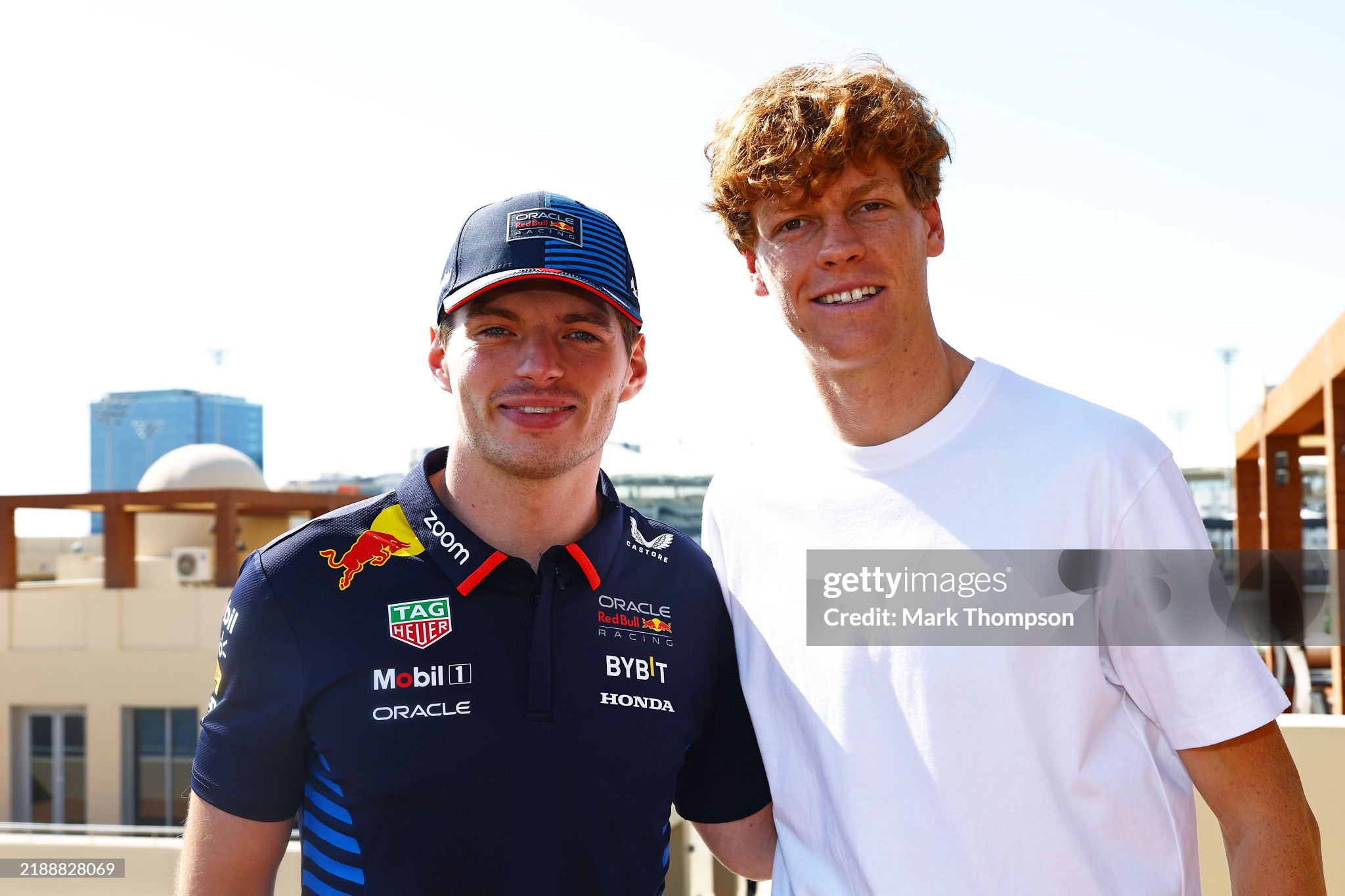 Max Verstappen of the Netherlands and Red Bull and Jannik Sinner pose for a photo in the paddock prior to the F1 Grand Prix of Abu Dhabi at Yas Marina Circuit on 08 December 2024 in Abu Dhabi, United Arab Emirates. 