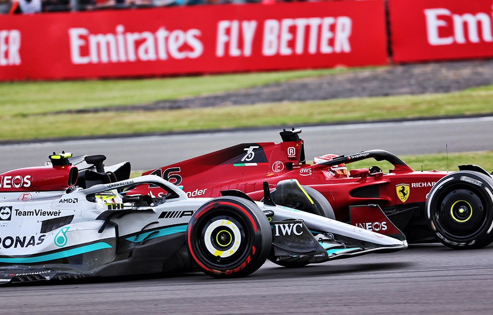 Charles Leclerc and Lewis Hamilton fighting at Silverstone in 2022.