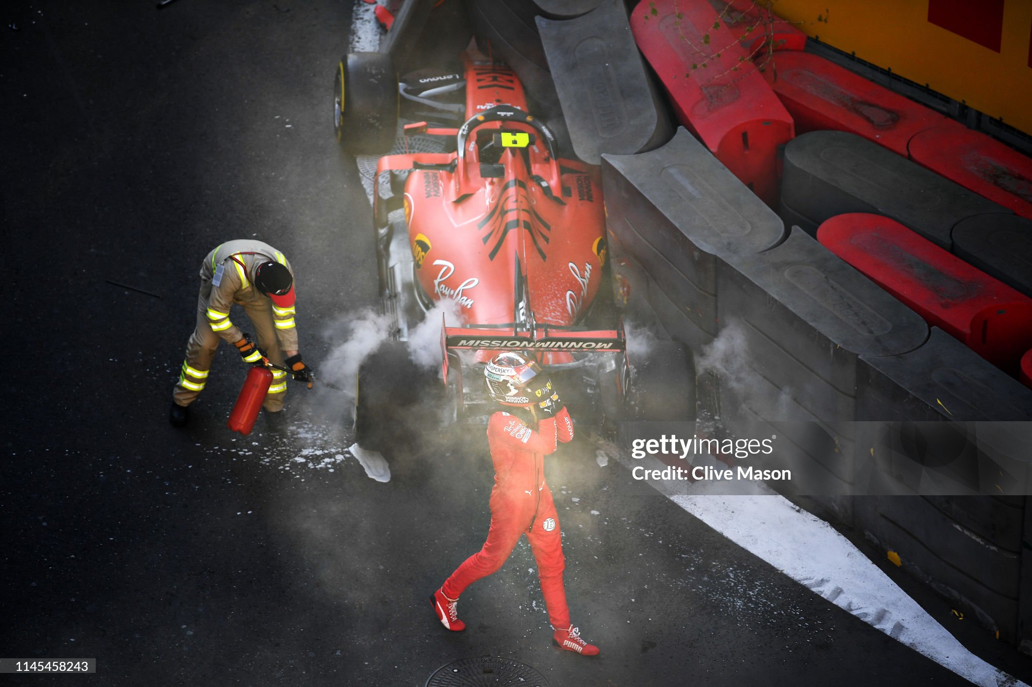 Charles Leclerc looks dejected as he walks from his car after crashing during qualifying for the F1 Grand Prix of Azerbaijan at Baku City Circuit on April 27, 2019. 