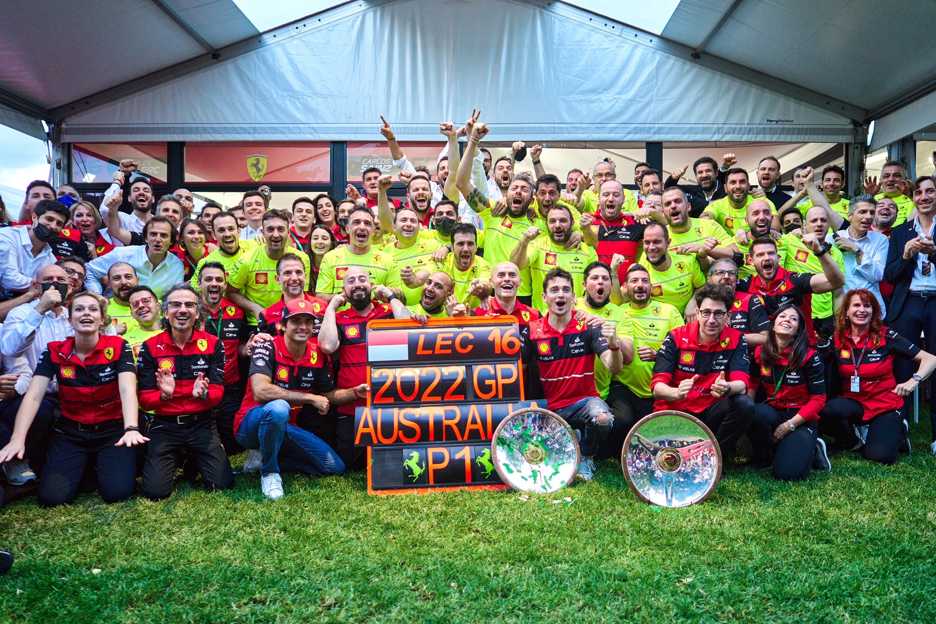 Ferrari team celebrates Charles Leclerc’s first place in the 2022 Australian Grand Prix.