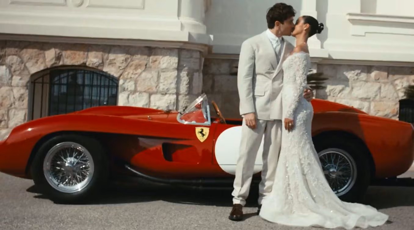 Charles, Alexandra and the vintage red Ferrari 250 Testa Rossa.