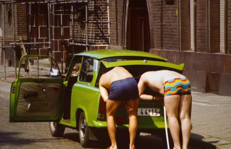 Two men and a green Trabant 601.