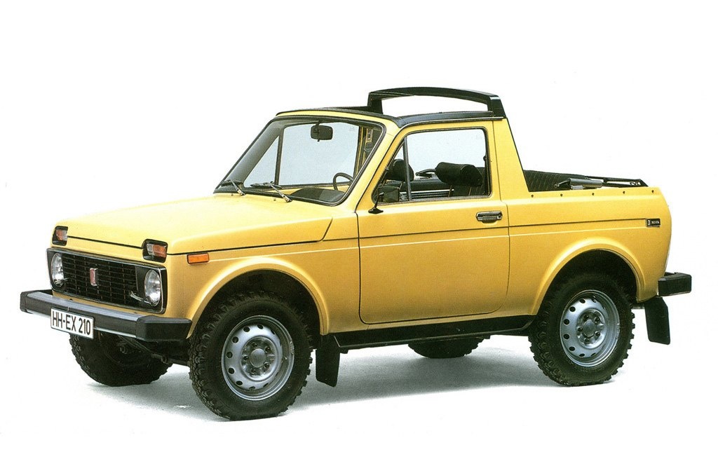 A yellow Lada Niva pick up.