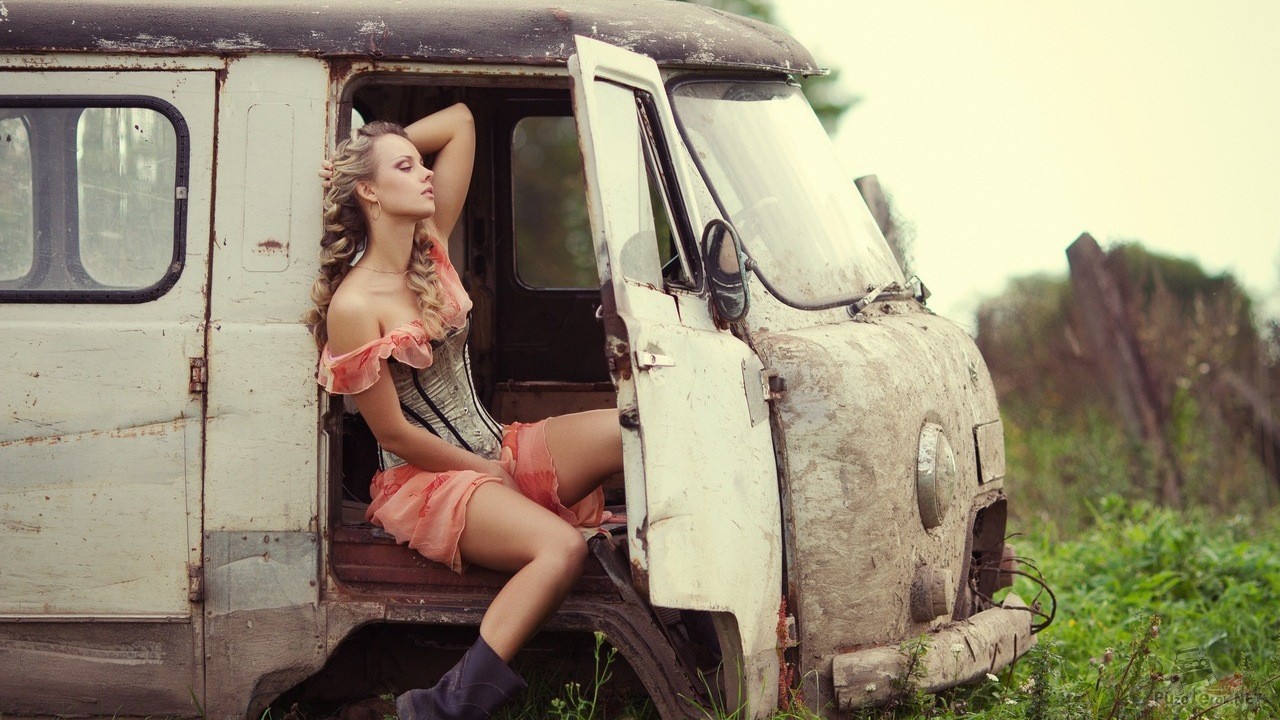 A girl in a UAZ-452.