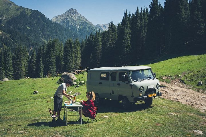 A couple and a UAZ-452.