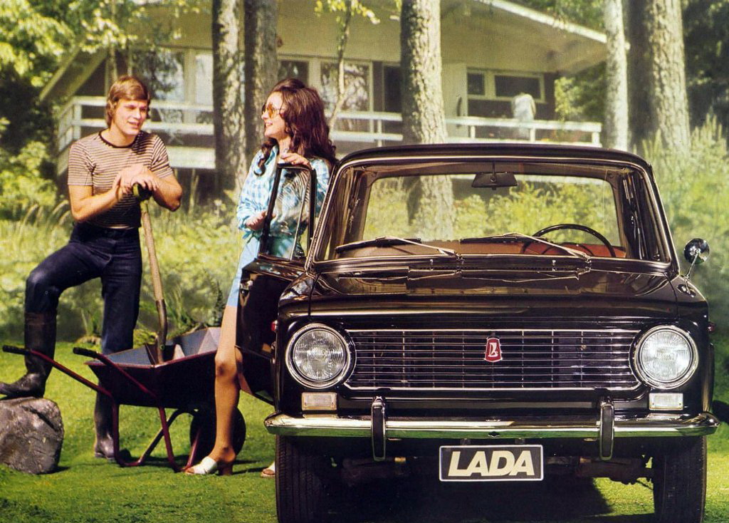 Two Russians drive their Lada.