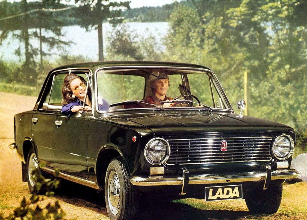 Two Russians drive their Lada.