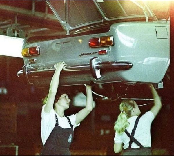 Workers on the AvtoVAZ assembly line, Tolyatti, USSR, 1981.