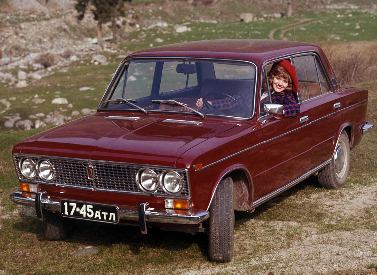 A girl in a violet Lada.