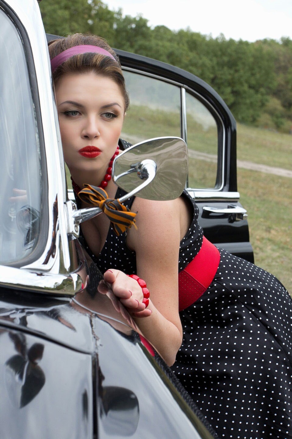 A model and a Russian car.
