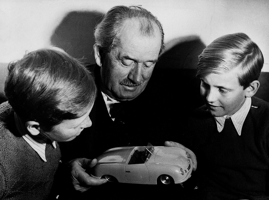 1949. F. Porsche with his grandchildren Ferdinand Alexander Porsche (left) and Ferdinand Karl Piėch (right). Both young boys were to become serious players in the future. 