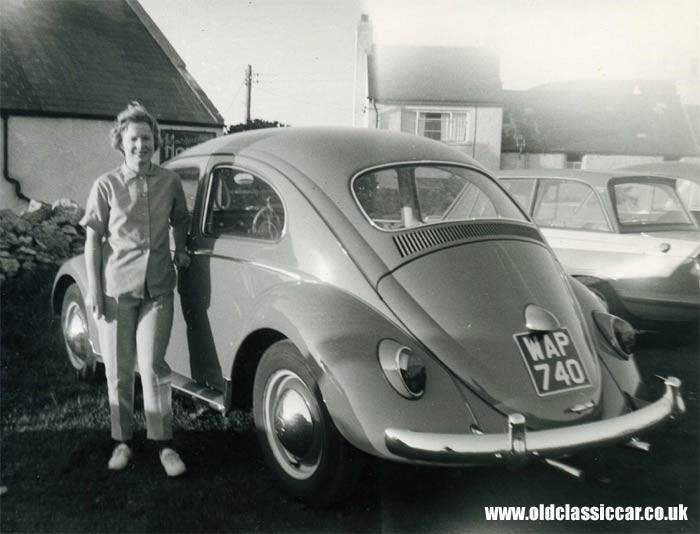 A woman and a Beetle.