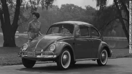 A woman and a Beetle.
