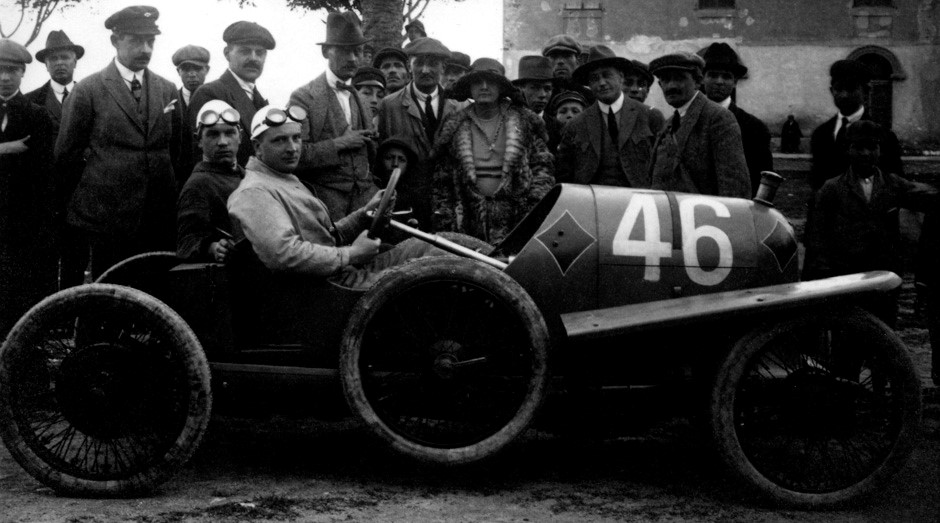 1922 Targa Florio. At the wheel of the Sascha is Alfred Neubauer, accompanied by his mechanic Georg Auer. Alfred Neubauer was entered for the higher-powered category with an uprated Sascha and completed the race at an average speed only 5 mph/8 km/h slower than on the cars, that had up to four times as much power available. 