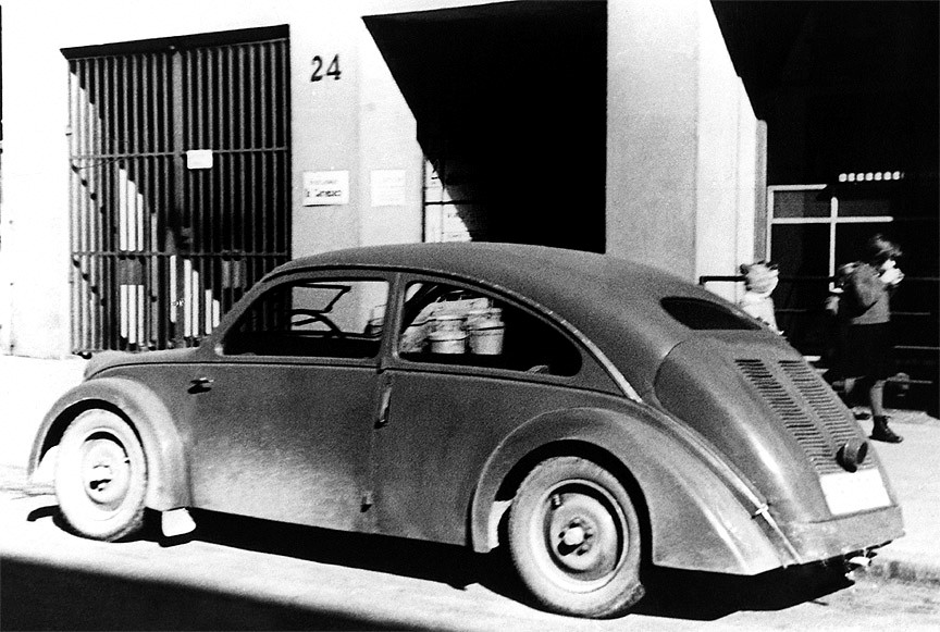 1933 Porsche type 32 NSU in front of the Porsche Engineering Office at Kronenstrasse 24, Stuttgart.