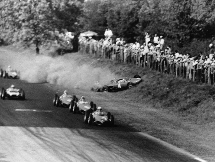 10th September 1961: the Ferrari of Wolfgang von Trips is about to crash into the crowd during the disaster at Monza. The car in the lead is n.2, driven by Phil Hill, who went on to win the race. 
