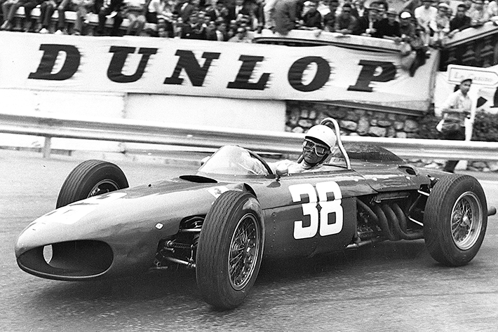 Phil Hill in action in the Station (now Loew's) Hairpin. The 156's 65-degree V-6, based on the original 2.0-2.4 V-6, was replaced mid-season with an even more powerful 120-degree V-6. Power was the key to Ferrari's dominance in 1961.
