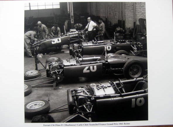 Team chief Carlo Chiti and Ferraris 156 Dino F1 (Shark Nose) at 1961 France Grand Prix in Reims.