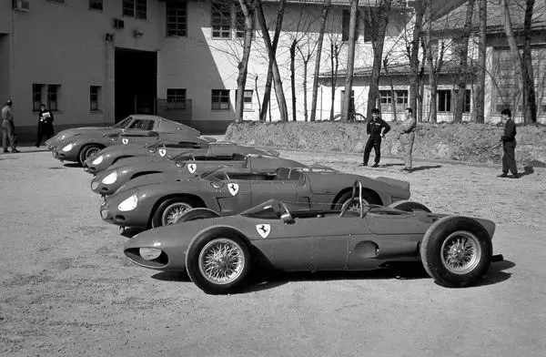 The 156 at Maranello, home of Ferrari, with a selection of F1 racing Ferraris.