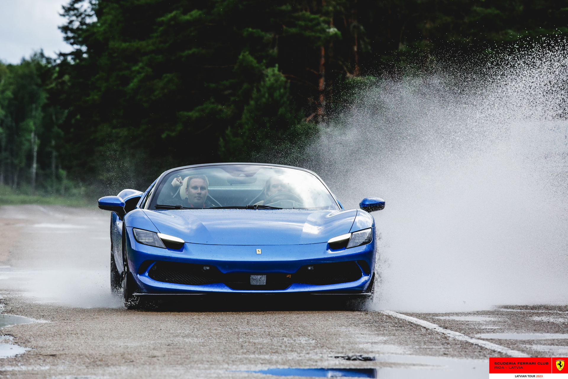 A blue Ferrari in action at Razna lake. 