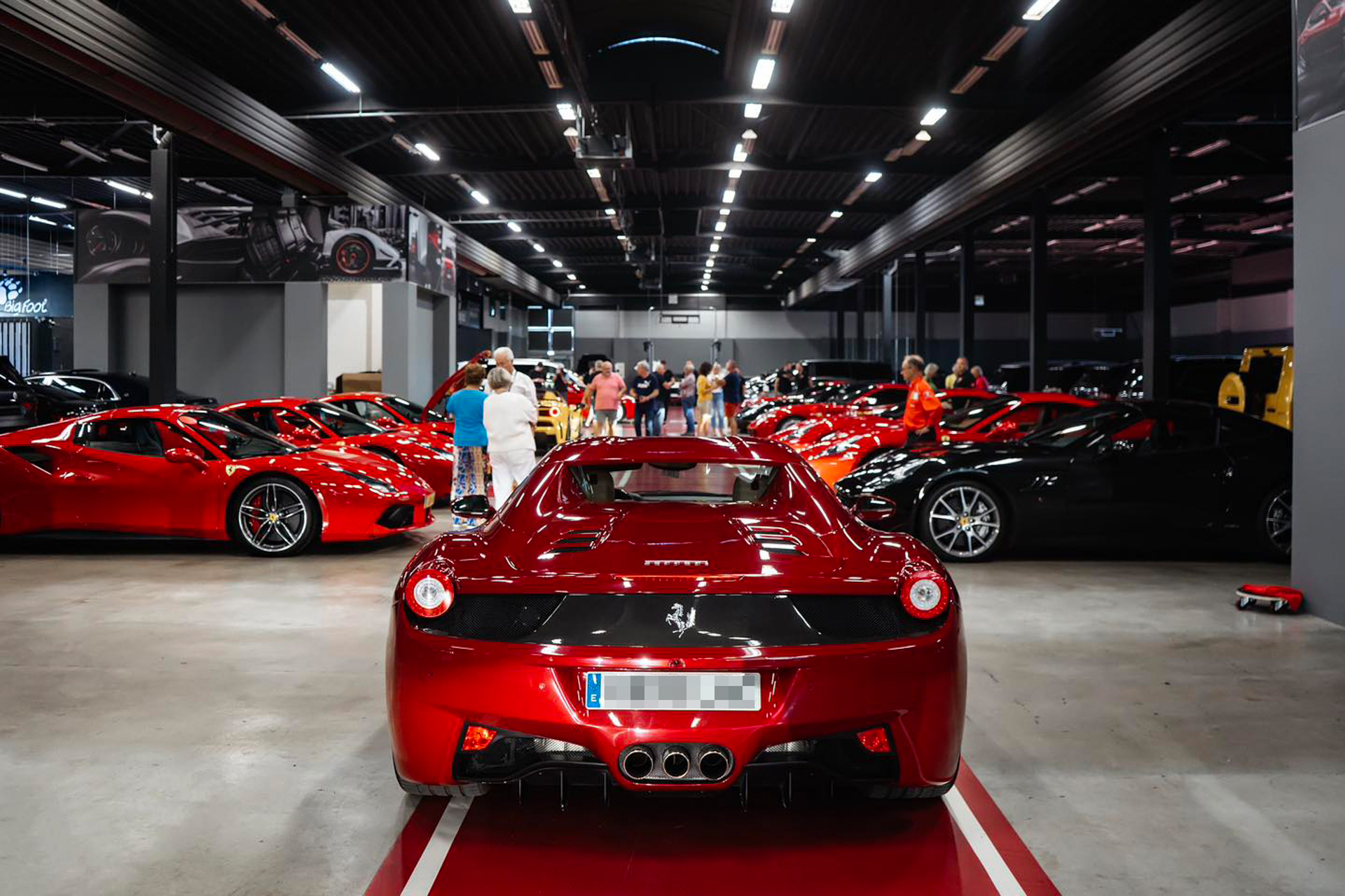 Ferraris and owners at Stuttgart.