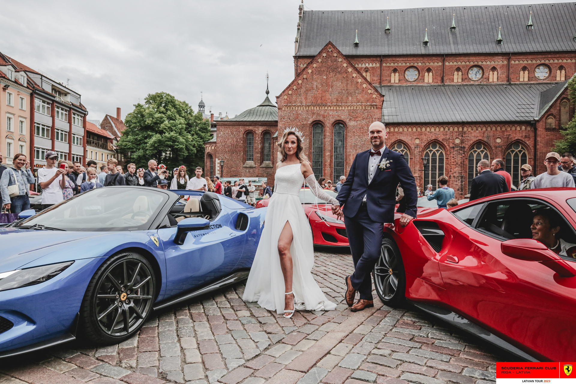 A newly wed couple and Ferraris. 