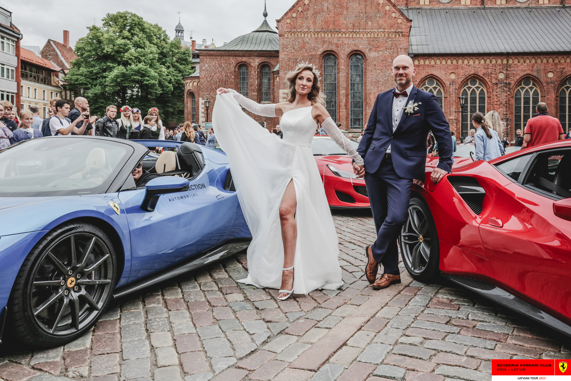 A newly wed couple and Ferraris. 