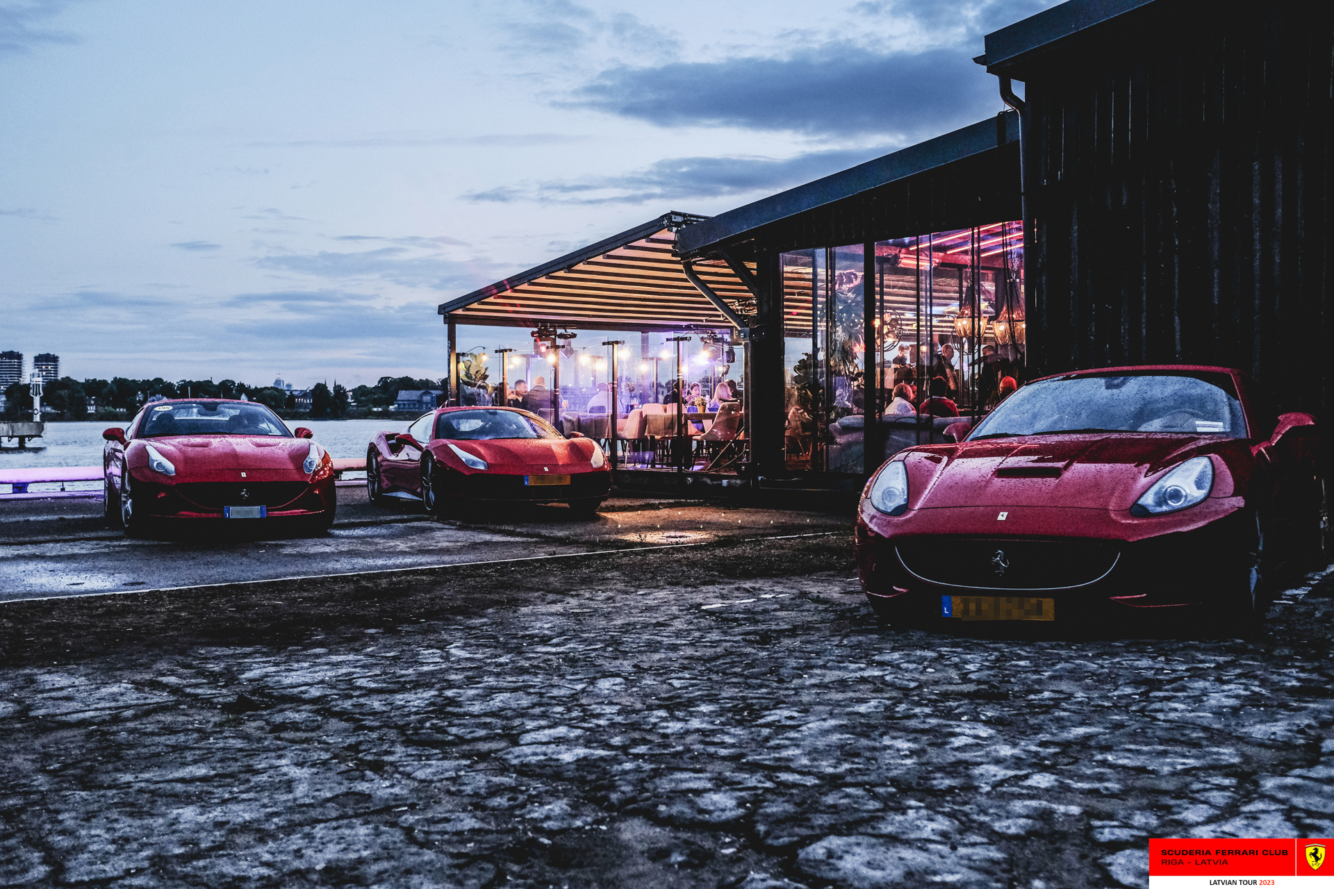 Ferraris parked in front of Koya. 