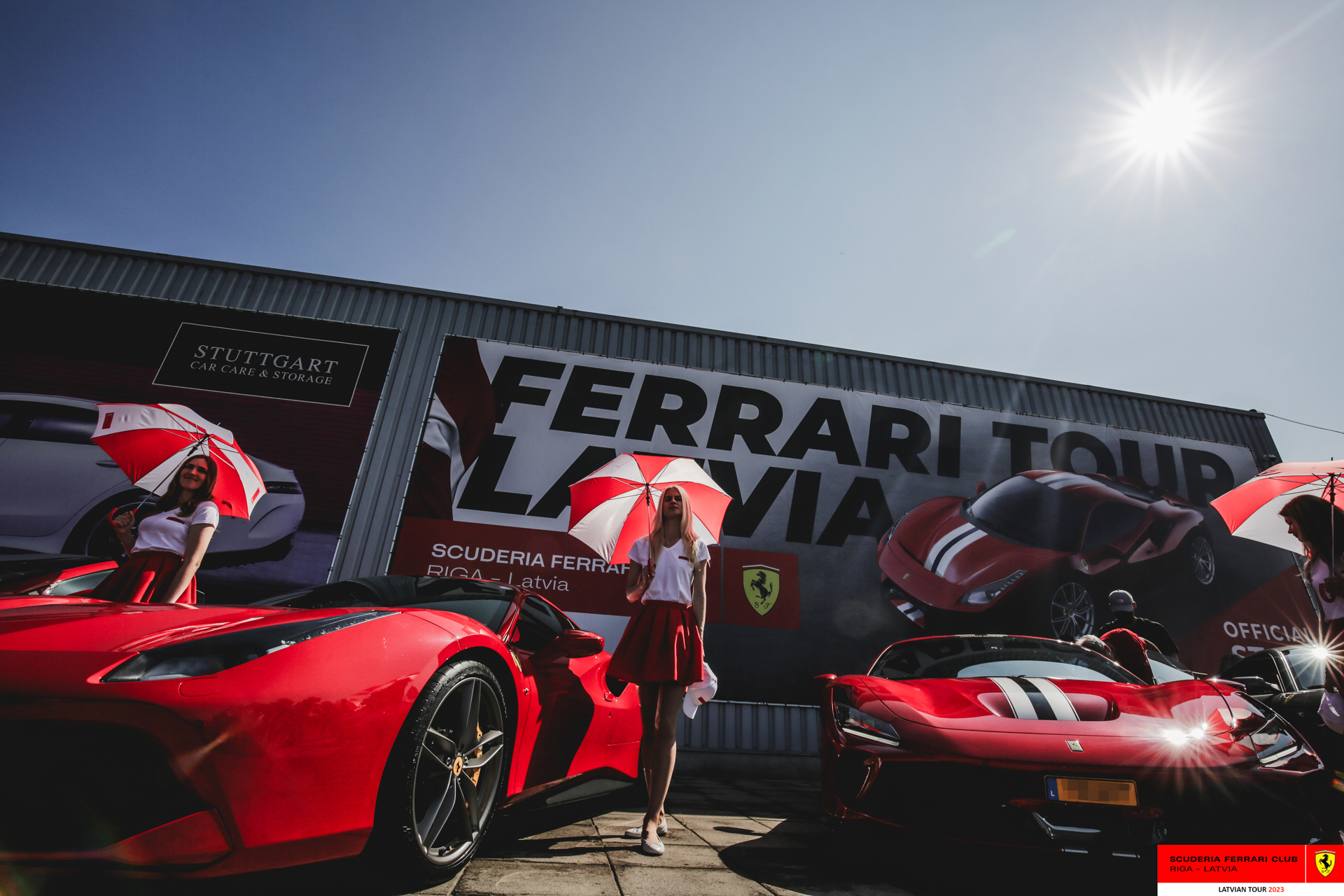 Grid girls and Ferraris.