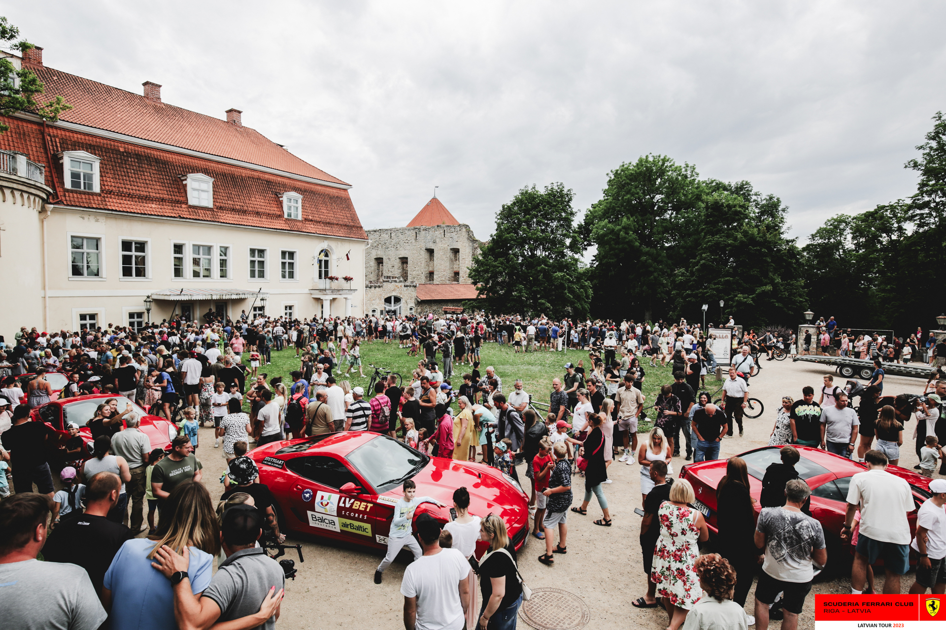 Cesis gathers in Pils Laukums to welcome the Ferrari tour with great affection. 