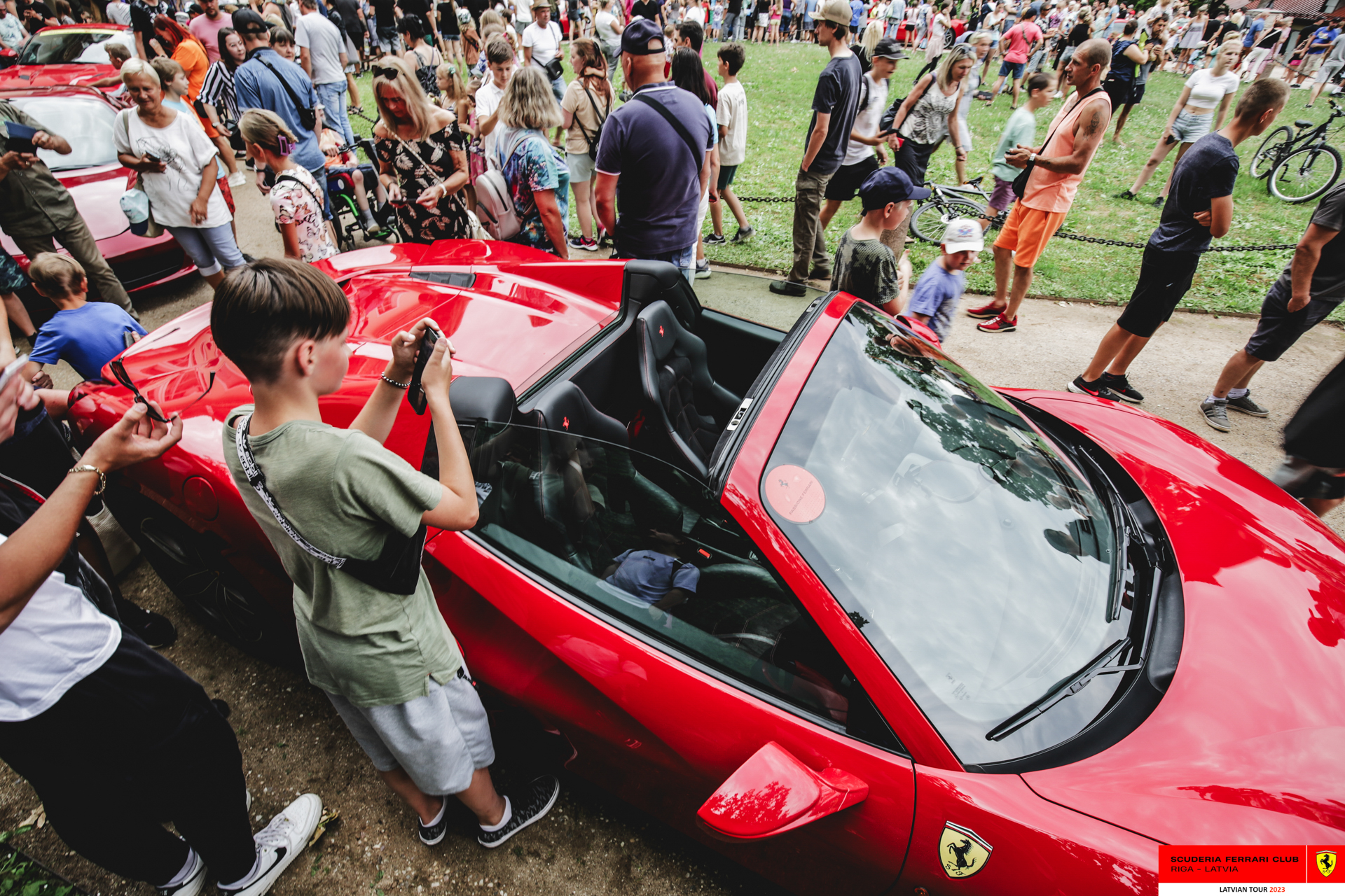Cesis gathers in Pils Laukums to welcome the Ferrari tour with great affection.