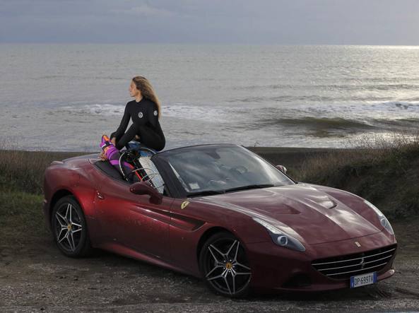 Flavia Tartaglini on a Ferrari California T.