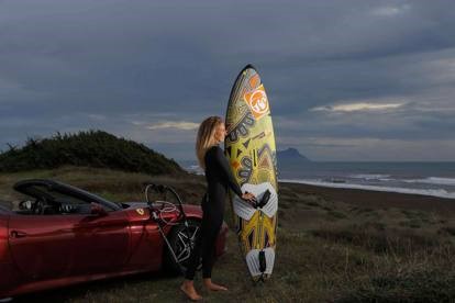 Flavia Tartaglini and a Ferrari California T.