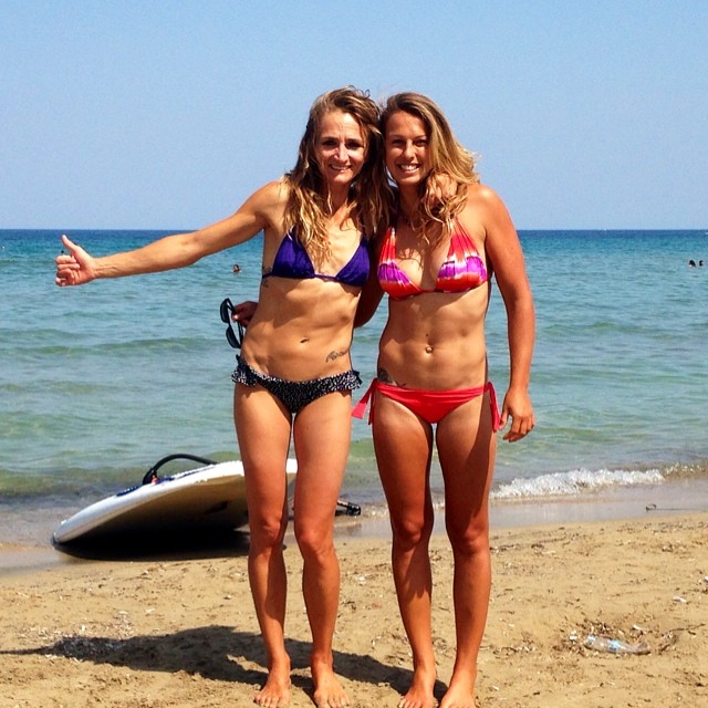 Flavia Tartaglini with her best friend at the beach bar ‘Albatross’ at Kamari Beach, Greece, in July 2014.