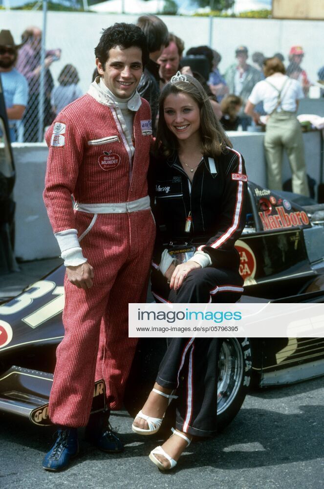 Hector Rebaque, Lotus Ford, with Marlboro promotion girl Sherry at the US West Grand Prix in Long Beach on 08 April 1979.