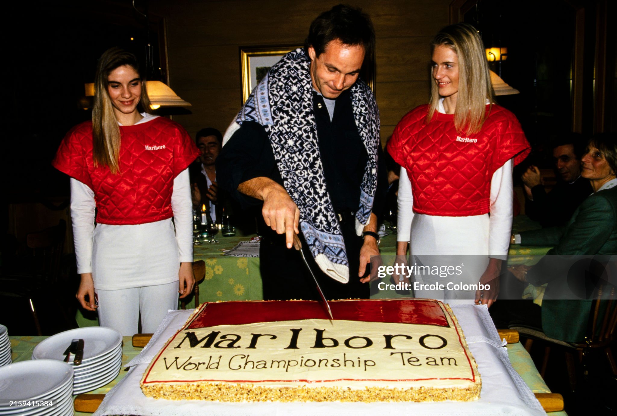 Gerhard Berger cutting a cake on Saturday January 01, 1994. 